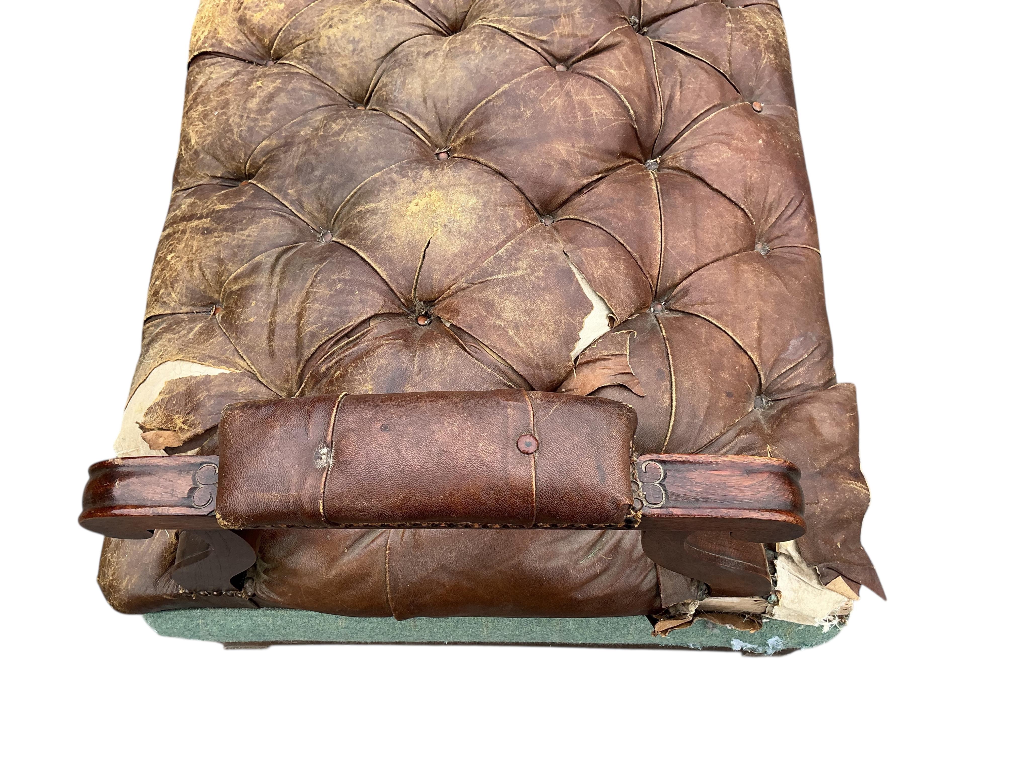 A Victorian oak and buttoned brown leather bench seat, width 266cm, depth 84cm, height 72cm